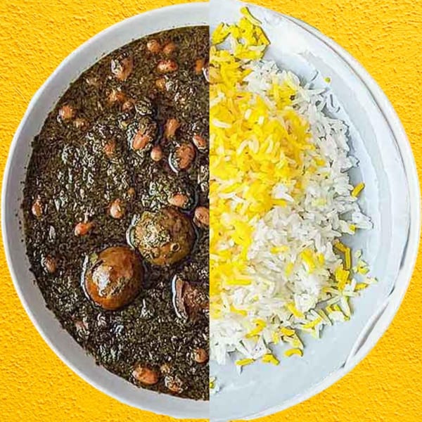 A plate of Persian ghormeh sabzi stew with meatballs and white and yellow rice.